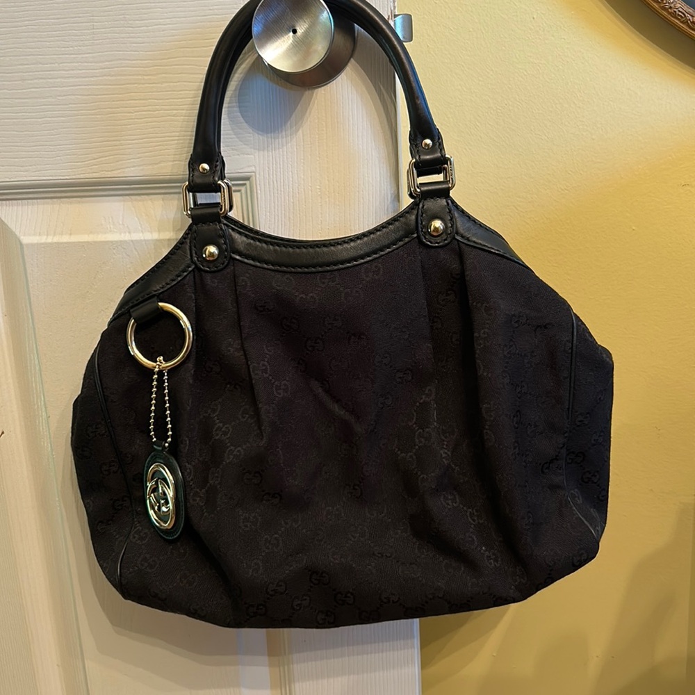 EC Black Gucci Canvas Sukey Bag with Authentication Card.